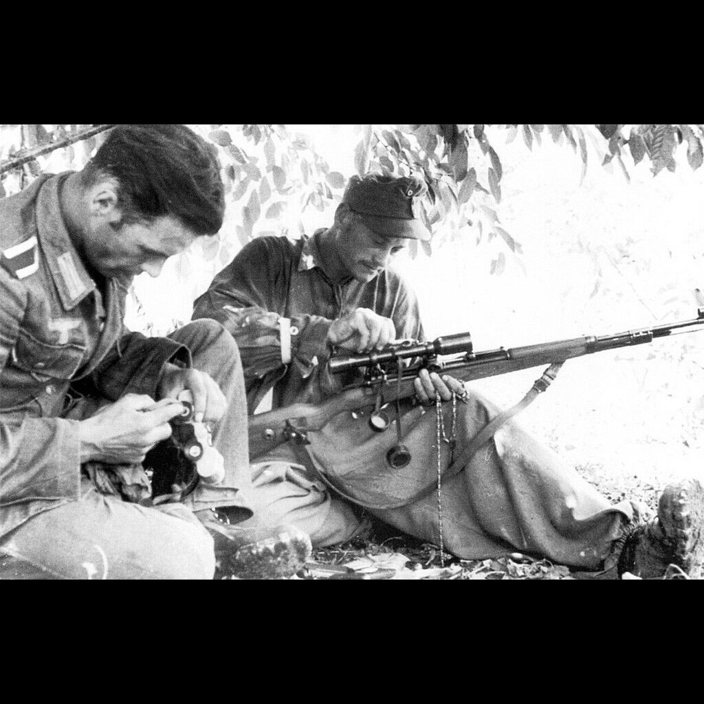 Soldiers Cleaning Guns